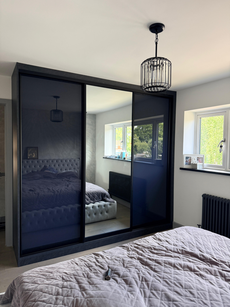 Made-to-measure sliding wardrobes designed specifically around the dimensions of the room.