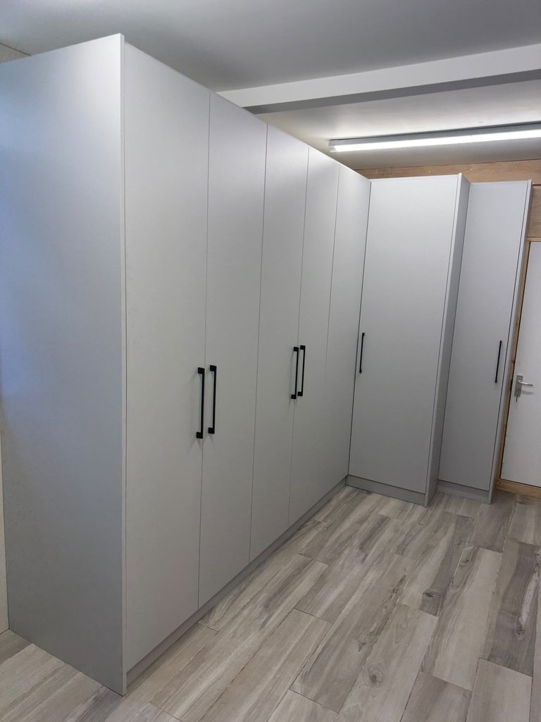 Made-to-measure garage cabinets designed to maximise wall space and provide organised fitted storage in a St Albans home
